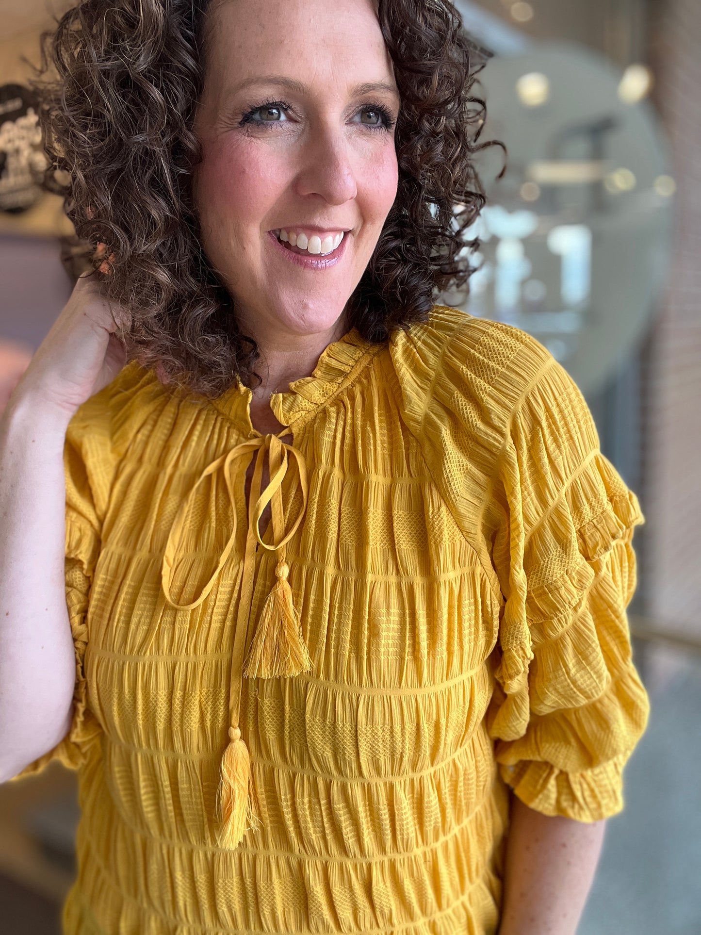 Ruffled Half Sleeve Top with Tie & Tassel Detail