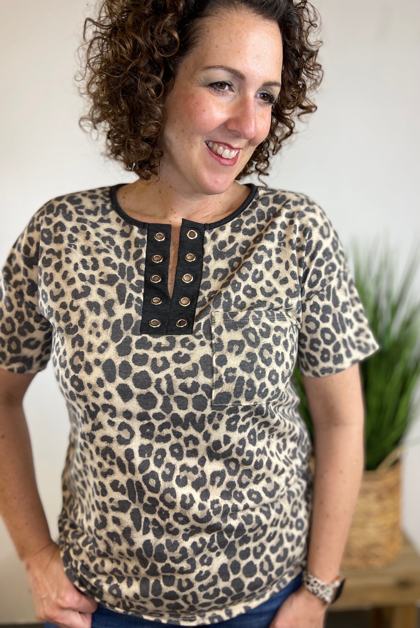 Leopard Split Neck Top with Grommet Detail