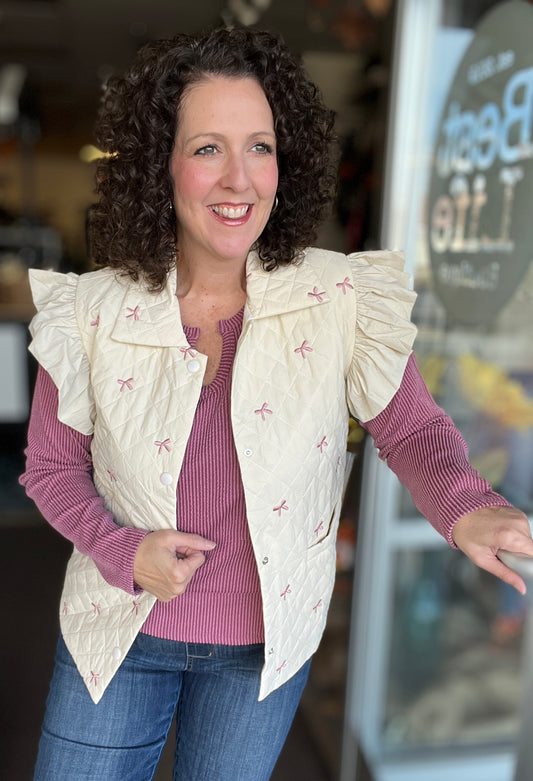 Quilted Vest with Embroidered Bows