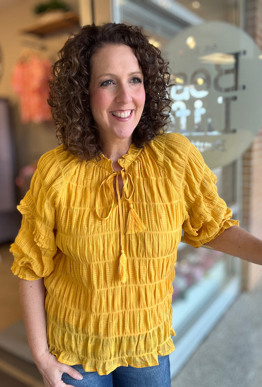 Ruffled Half Sleeve Top with Tie & Tassel Detail