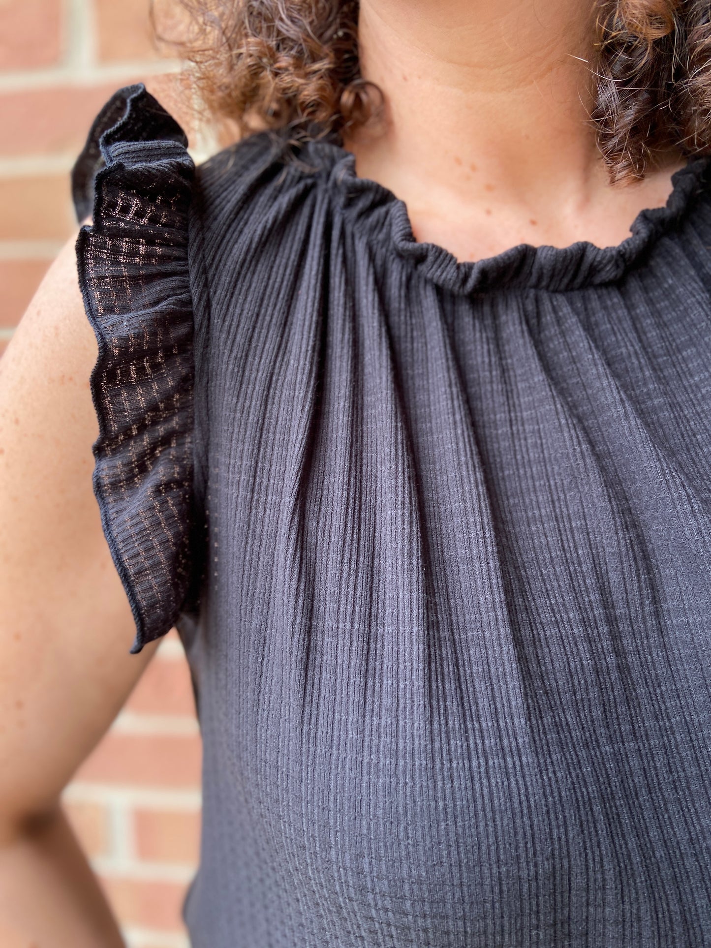 Ruffled Edge Sleeveless Top