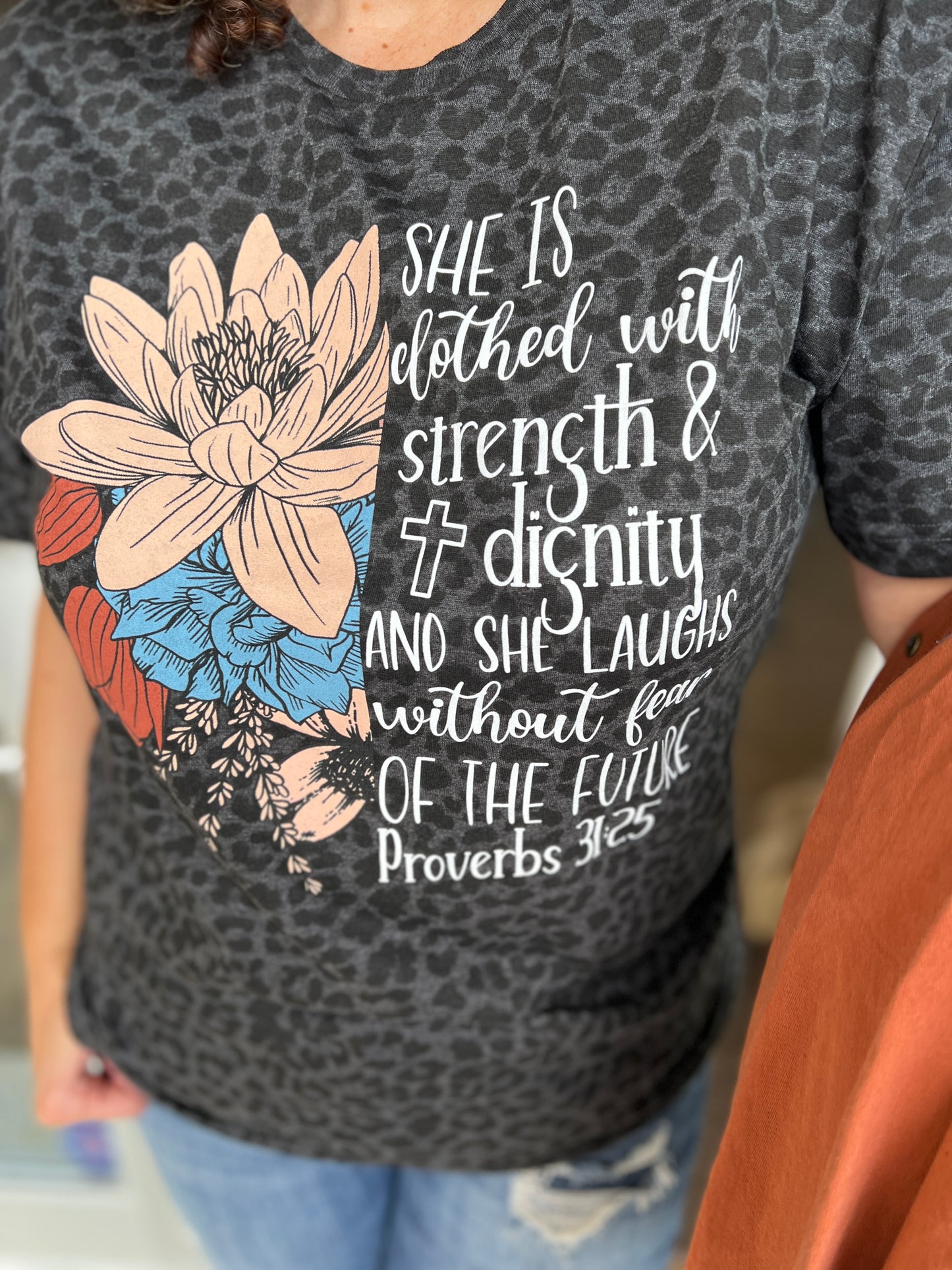 SHE IS CLOTHED IN DIGNITY Graphic Tee